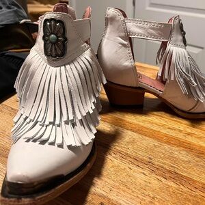 Western inspired leather booties from Lane. Genuine leather.